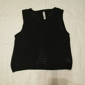 Knitted sweater tank top with split back.